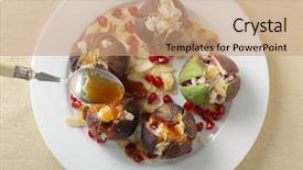  Presentation with almond - Beautiful presentation featuring fresh figs stuffed with mizithra sheep's cheese and toasted almond slivers topped with honey and garnished with pomegranate seeds seen from above backdrop and a coral colored foreground