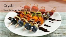 Presentation with fruits - Audience pleasing PPT theme consisting of fresh fruits on skewers backdrop and a red colored foreground