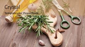  Presentation with olive oil - Presentation design with fresh garden rosemary with garlic and olive oil on cutting board over wooden table background and a yellow colored foreground