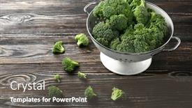  Presentation with fresh green broccoli - Cool new presentation theme with fresh green broccoli in colander on brown wooden table backdrop and a dark gray colored foreground