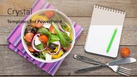  Presentation with notepad - Presentation design enhanced with fresh healthy salad and notepad for copy space and silverware on wooden table view from above background and a coral colored foreground