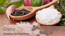  Presentation with spoon - Audience pleasing presentation consisting of fresh herbs and salt spoon on vintage wooden background shallow focus backdrop and a coral colored foreground