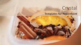  Presentation with orange slice - Presentation theme featuring fresh orange slice cinnamon sticks and grated dry spices in liquid soap mass inside plastic container background and a lemonade colored foreground