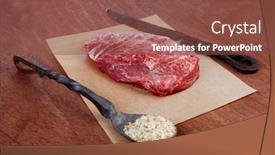  Presentation with table salt - Presentation theme with fresh raw beef rib eye steak on walnut table with salt spice and black iron antique forged cutlery fork knife background and a tawny brown colored foreground