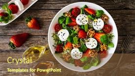  Presentation with leafy greens - Presentation having fresh-salad-goat-cheese-strawberries background and a tawny brown colored foreground