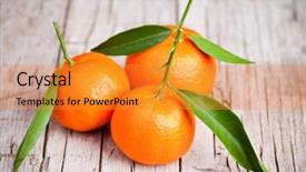  Presentation with rustic - Cool new slide deck with fresh tangerines with leaves on rustic wooden table backdrop and a gold colored foreground