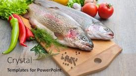  Presentation with cutting board - Beautiful presentation design featuring fresh trout fish vegetables herbs and spices on cutting board backdrop and a coral colored foreground