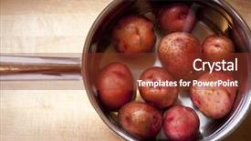  Presentation with stainless steel - Slide set consisting of fresh uncooked red new potatoes in a silver stainless steel pot view from above background and a tawny brown colored foreground