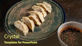  Presentation with soy sauce - Slides having fried-dumplings-gyoza-with-soy background and a tawny brown colored foreground