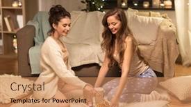  Presentation with cacao - Theme consisting of friendship hygge and pajama party concept - happy female friends or teenage girls with cacao and waffles on tray at home background and a coral colored foreground