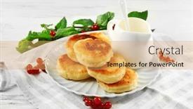  Presentation with currant - Theme with fritters of cottage cheese with red currant in plate on table closeup background and a yellow colored foreground