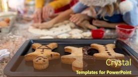  Presentation with baking cookies - Slide set enhanced with front view close up of a young caucasian mother with her young daughter and son in their kitchen at christmas time making cookies with a baking tray with cooked gingerbread man cookies on it on background and a tawny brown colored foreground