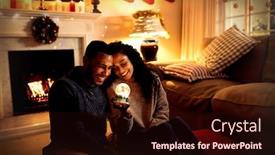  Presentation with looking glass - Audience pleasing slide deck consisting of front view of a mixed race couple in their sitting room at christmas sitting on a floor looking at a glass globe and smiling backdrop and a wine colored foreground