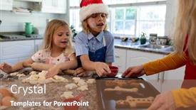  Presentation with gingerbread man - Audience pleasing presentation design consisting of front view of a young caucasian mother with her young daughter and son in their kitchen at christmas time making cookies together mum holding a baking tray with cooked gingerbread man cookies on it backdrop and a violet colored foreground
