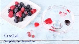  Presentation with ice frozen - Presentation theme enhanced with frozen forest berries on plate and cocktail with berries frozen in ice cubes on wooden table background background and a sky blue colored foreground