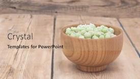  Presentation with peas - Colorful presentation theme enhanced with frozen peas in a wooden bowl on a wooden table backdrop and a coral colored foreground