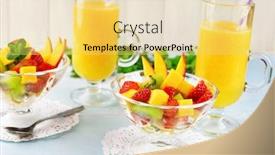  Presentation with orange fruit - PPT theme consisting of fruit salad with mint and orange juice in glassware on wooden table and planks background background and a yellow colored foreground