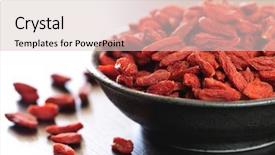  Presentation with goji - Presentation having full bowl of red dried goji berries background and a lemonade colored foreground