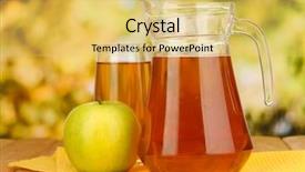  Presentation with juice - Colorful presentation theme enhanced with full glass and jug of apple juice and apple on wooden table outdoor backdrop and a yellow colored foreground