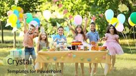  Presentation with birthday kids - PPT theme having funky kids - children celebrating birthday in park background and a yellow colored foreground