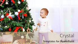  Presentation with baby tree - PPT theme featuring funny baby girl decorating christmas tree on bright background background and a coral colored foreground