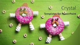  Presentation with donuts - Audience pleasing theme consisting of funny-decorated-donuts-on-table backdrop and a yellow colored foreground