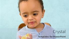  Presentation with eat - Presentation enhanced with funny toddler with a snotty nose trying to eat a lemon background and a light blue colored foreground