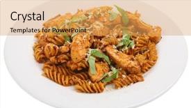  Presentation with dried tomato - Beautiful presentation featuring fusilli pasta with chicken pieces in a sun-dried tomato and olive sauce backdrop and a yellow colored foreground