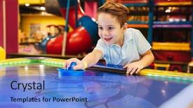  Presentation with joyful - PPT theme having game - joyful little boy playing air background and a teal colored foreground