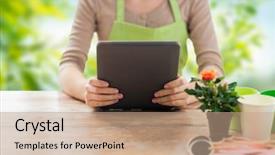  Presentation with green technology - Cool new theme with gardener holding tablet pc computer backdrop and a coral colored foreground