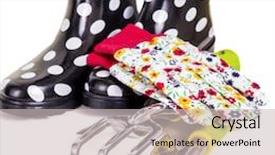  Presentation with rubber gloves - Slide deck having gardening tools gloves and rubber boots ready for some garden work focus on the tools background and a soft green colored foreground