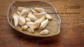  Presentation with rustic wood - Slide set featuring garlic-cloves-on-a-ceramic background and a coral colored foreground