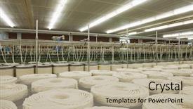  Presentation with spinning - Colorful presentation theme enhanced with garment industrial - view of cotton rolls backdrop and a mint green colored foreground