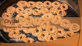  Presentation with frying - PPT theme featuring ghee - close-up of delicious jalebis frying background and a gold colored foreground