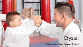  Presentation with karate - Slides having gi - male karate instructor training little background and a light gray colored foreground