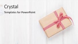  Presentation with gift - PPT theme having gift box on wooden table background and a white colored foreground