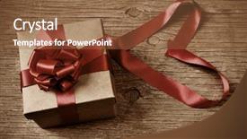  Presentation with gift ribbon - Beautiful slides featuring gift box tied with red ribbon on a rustic wooden table and red ribbon forming a heart with a retro effect backdrop and a tawny brown colored foreground