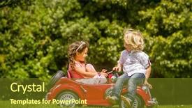  Presentation with car park - PPT theme featuring young happy children - boy and girl - driving a toy car outdoors in park background and a tawny brown colored foreground