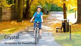  Presentation with biking - Beautiful presentation theme featuring girl biking in city park backdrop and a light blue colored foreground