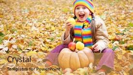  Presentation with child eat - Slides having girl child in autumn forest sit on yellow leaves eat apple and pumpkin background and a yellow colored foreground