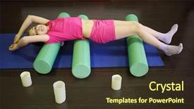  Presentation with childs - Amazing PPT layouts having girl childs smiles and does exercise on three rollers on floor near candles backdrop and a tawny brown colored foreground