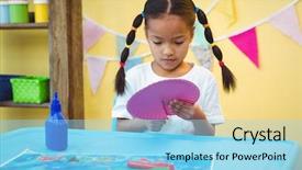  Presentation with paper cutting - PPT layouts with girl cutting a paper plate background and a arctic colored foreground