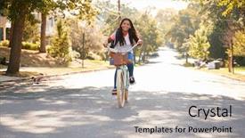  Presentation with bike - Amazing PPT theme having girl riding bike along street backdrop and a light gray colored foreground
