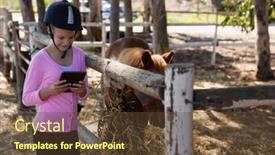  Presentation with ranch - Audience pleasing presentation theme consisting of girl-using-digital-tablet backdrop and a tawny brown colored foreground