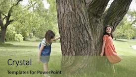  Presentation with hide - Amazing PPT theme having girls playing hide and seek backdrop and a mint green colored foreground