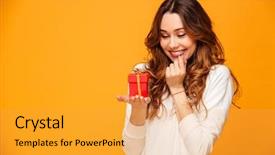  Presentation with gift - Presentation theme enhanced with girly - smiling brunette woman in sweater background and a yellow colored foreground