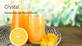  Presentation with orange juice - PPT theme having glass and pitcher of orange background and a cream colored foreground
