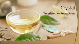  Presentation with oil - PPT layouts having glass bowl with tea oil background and a soft green colored foreground