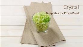  Presentation with celery - Amazing slide set having glass of chopped celery stems on beige place mat backdrop and a lemonade colored foreground