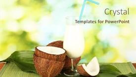  Presentation with green coconut - Beautiful theme featuring glass of coconut milk and coconuts on green background close-up backdrop and a soft green colored foreground